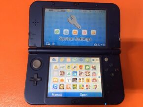 Nintendo New 3DS XL bleue  (32 GB) Flashé
